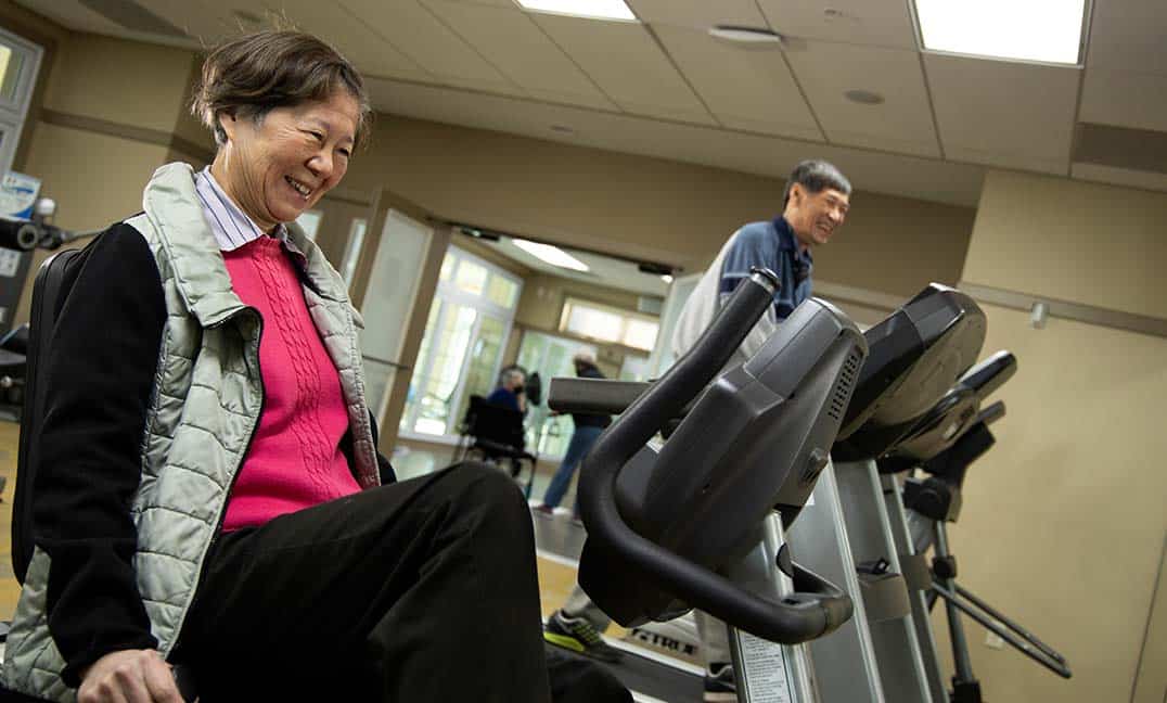 Women on recumbent exercise machine